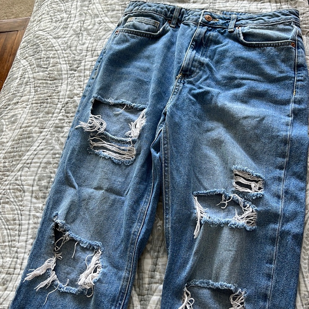 Ripped blue boyfriend jeans